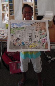 a happy participant holds up her painting